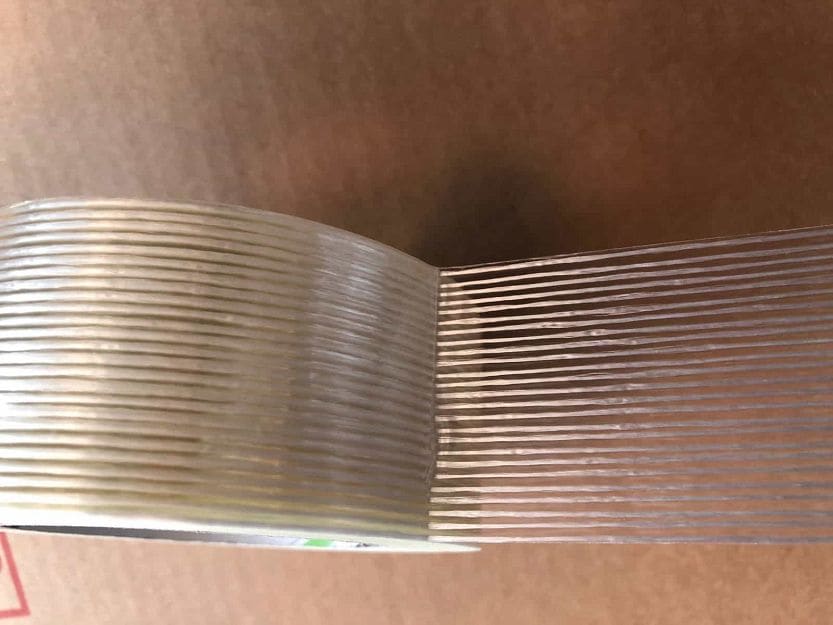 TAŚMA PAKOWA MONOFILAMENT WZMACNIANA WZDŁUŻNIE WŁÓKNEM SZKLANYM 50 mm x 50 m