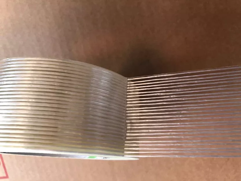 TAŚMA PAKOWA MONOFILAMENT WZMACNIANA WZDŁUŻNIE WŁÓKNEM SZKLANYM 50 mm x 50 m